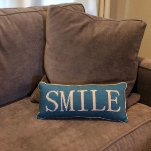 blue “smile” needlepoint accent pillow